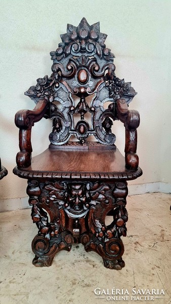 A557 antique, renaissance-style sgabello chairs with richly carved arms