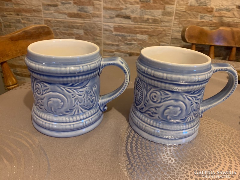 Pair of granite mugs/jugs with cheeky pointed human depictions, 2 pcs. Light blue