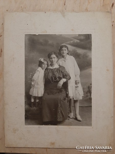 Old photo of mother with her daughters from 1916