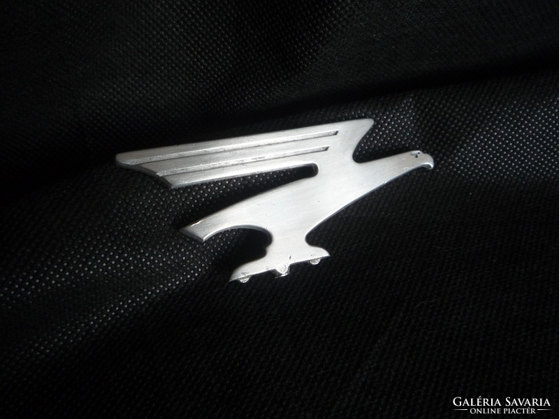 Adler' emblem.
