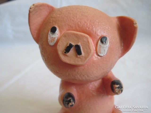 Old toy pig figure beeping beeping rubber toy raisin