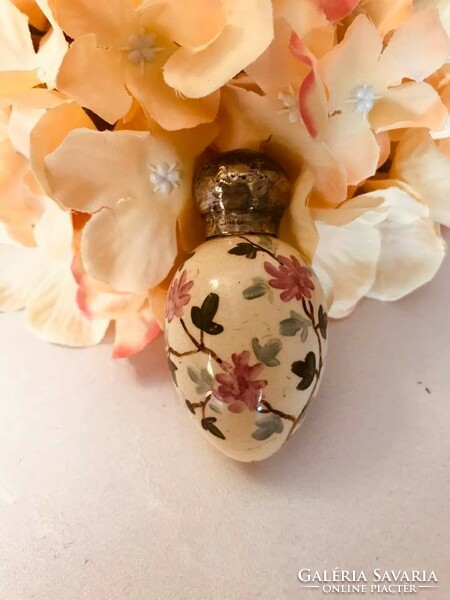 Antique earthenware egg-shaped perfume jar