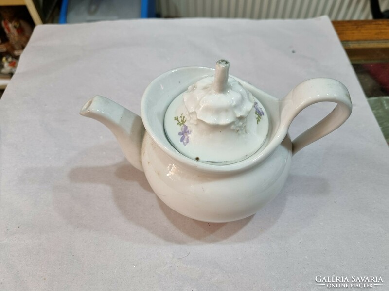 Old porcelain spout