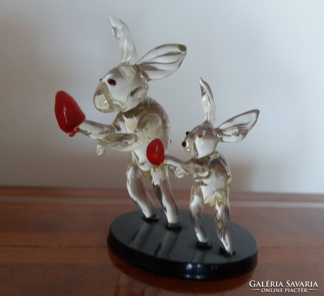 Old glass statue rabbit with red egg rabbit ornament