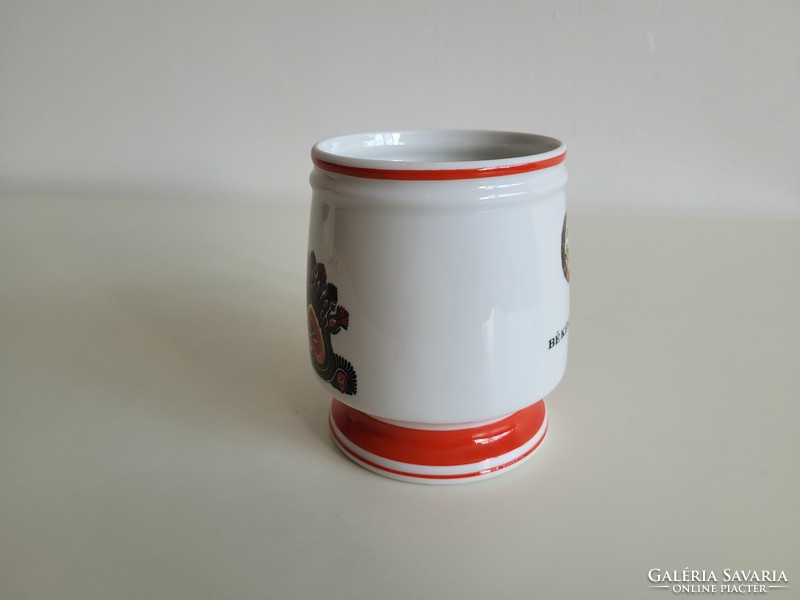 Old retro porcelain jug with red stars from Hóllóháza, mhsz souvenir