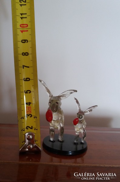 Old glass statue rabbit with red egg rabbit ornament