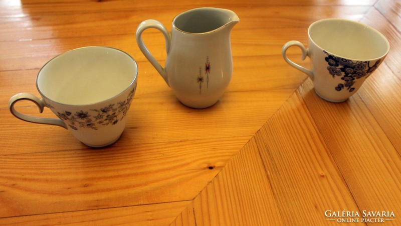 Assorted porcelain plates pouring cups