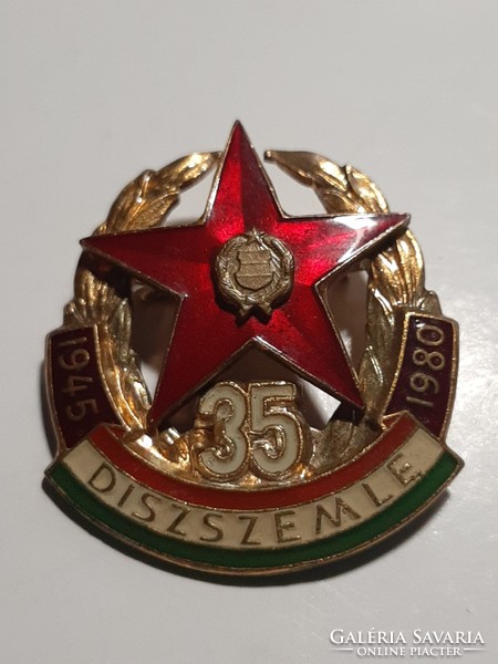 Ornament review 1945 - 1980 35 years enamelled metal badge