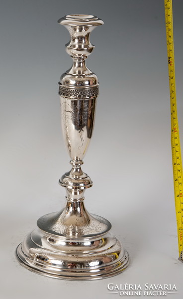 Silver candle holder with finely chiselled pattern