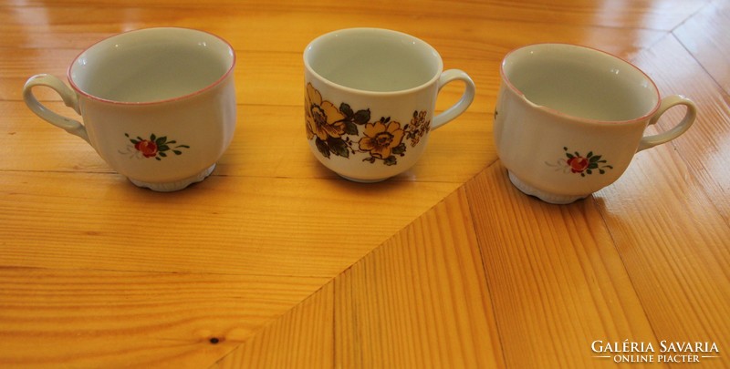 Assorted porcelain plates pouring cups