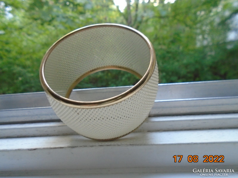 Cream-colored enameled metal wide grid bracelet with gold-plated rim