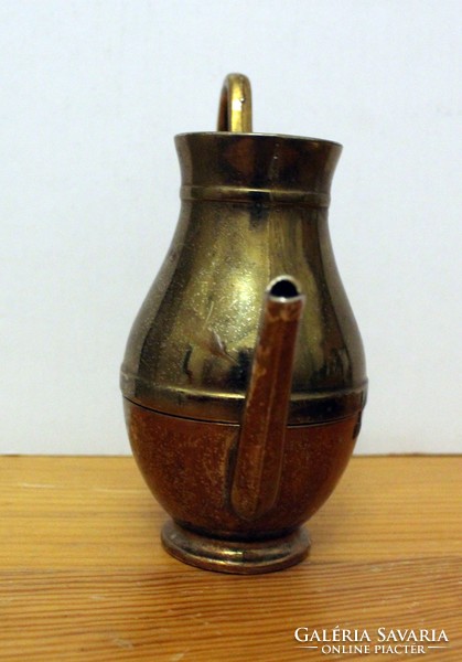 Tiny copper jug