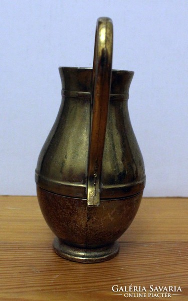 Tiny copper jug