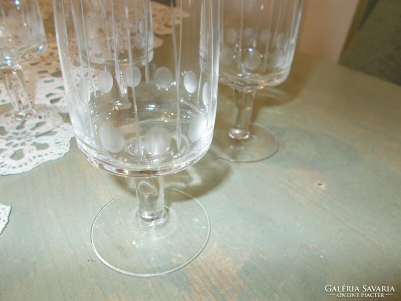 Polished liqueur and brandy glasses with soles