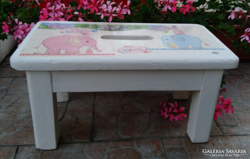 Decoupaged white wooden old stool and seat decorated with elephants and birds for children