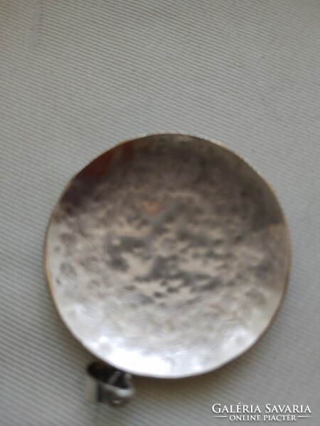 Large, round silver pendant