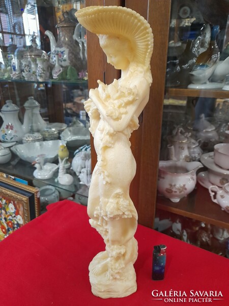 Large alabaster figure statue of a lady with a dovecote hat. 50 Cm.