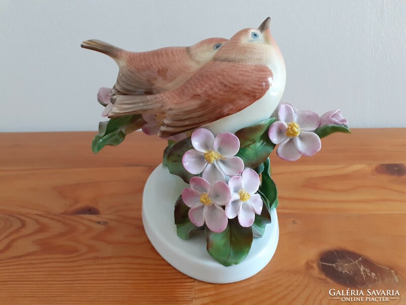 A large pair of herend birds among flowers