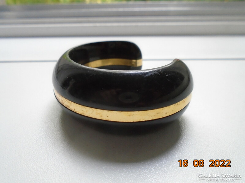 Elegant black lacquered wide, thick wooden bracelet with a gilded copper strip