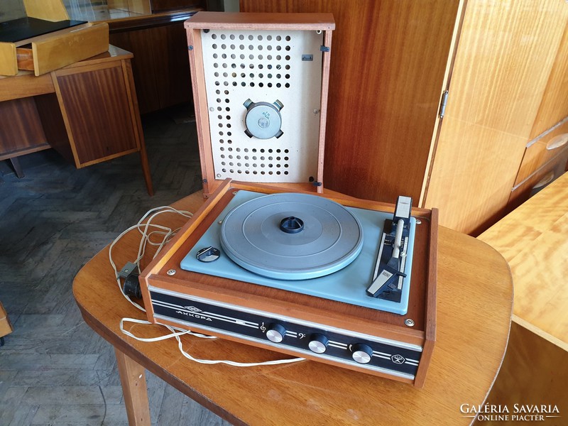 Old retro record player with wooden box mid century