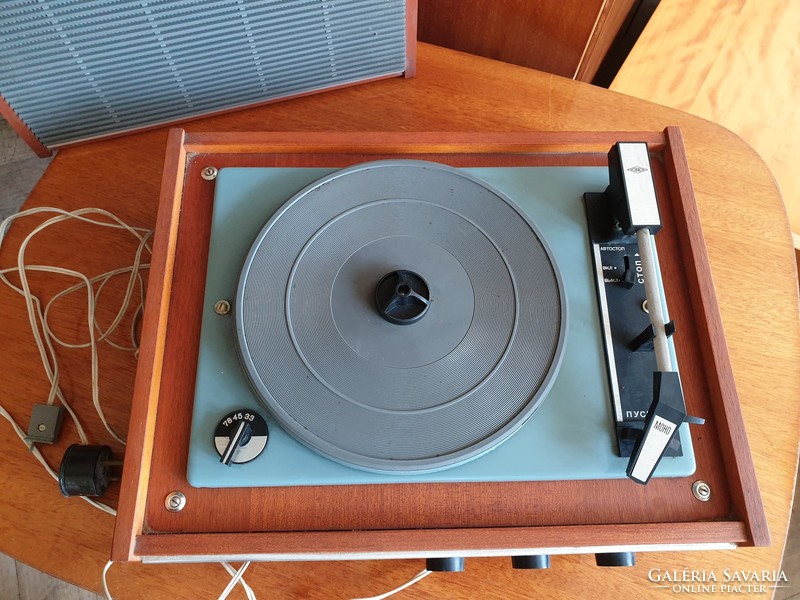 Old retro record player with wooden box mid century