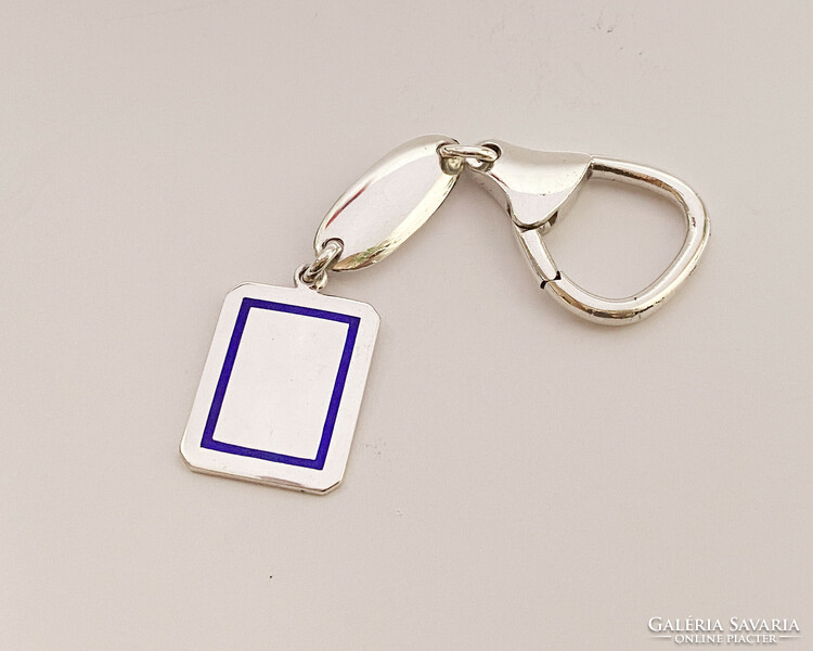 Solid, enamelled, engravable silver key ring.