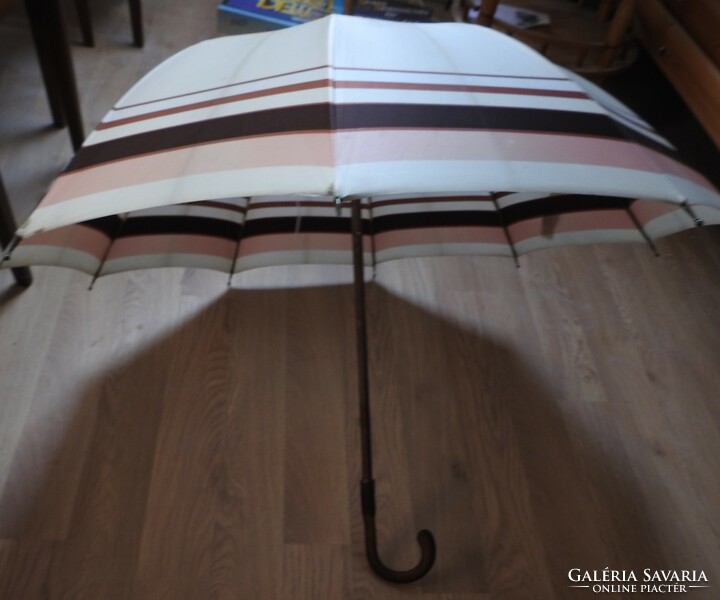 Old alexandra pastel colored wooden umbrella with vinyl handle
