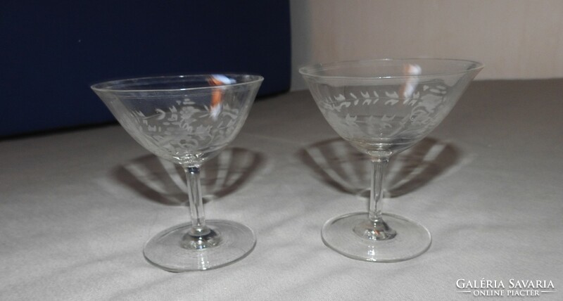 Two hand-polished glass stemmed glasses