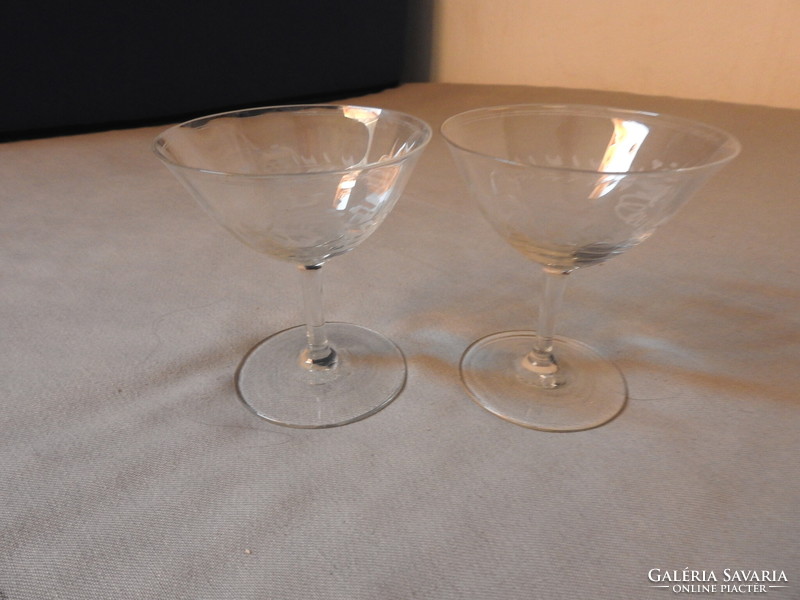 Two hand-polished glass stemmed glasses