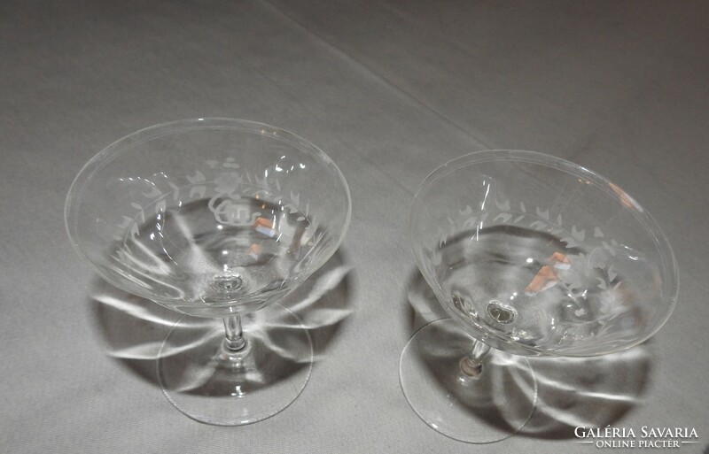 Two hand-polished glass stemmed glasses