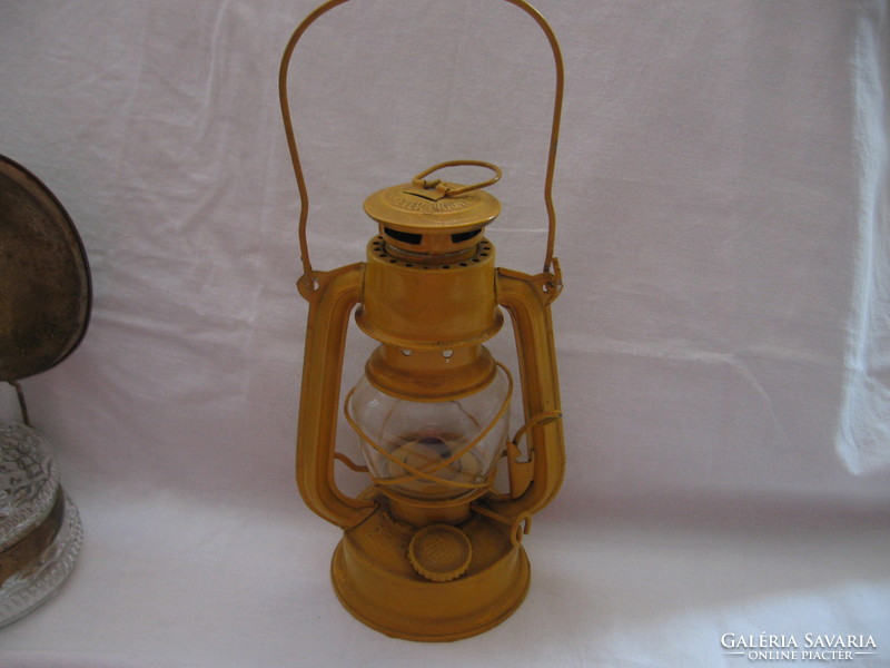 Old yellow Chinese storm lantern, kerosene lamp