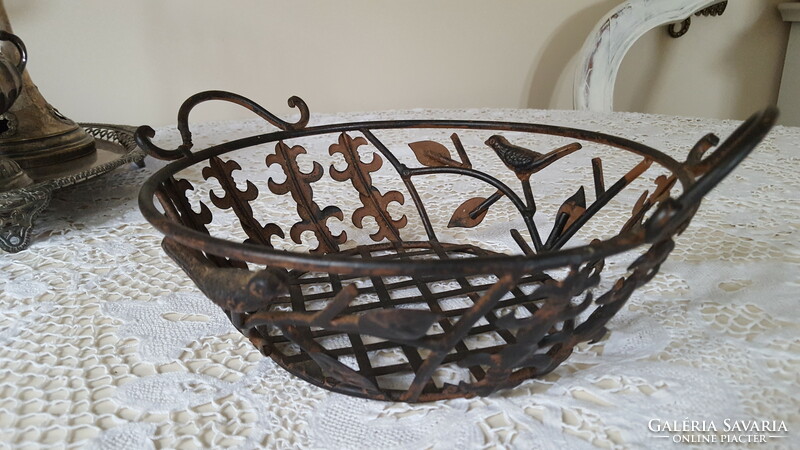 Decorative metal basket with bird and lily