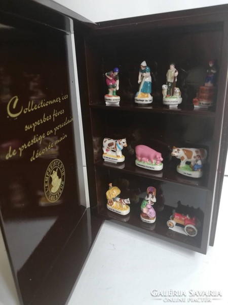 Rare French miniature porcelain figurine collection with storage
