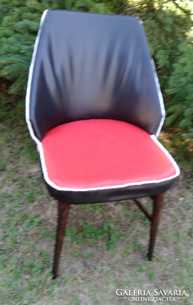 Retro renovated shell chair with red and black sky cover, wooden frame, stable condition, 1950s-60s