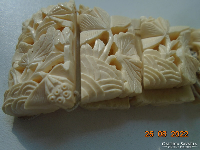 Antique, hand-carved bone, openwork oriental plant pattern wide bracelet