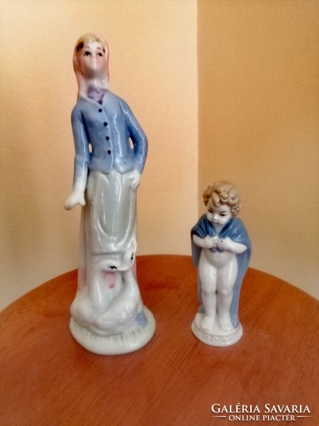 Porcelain woman with geese and a child