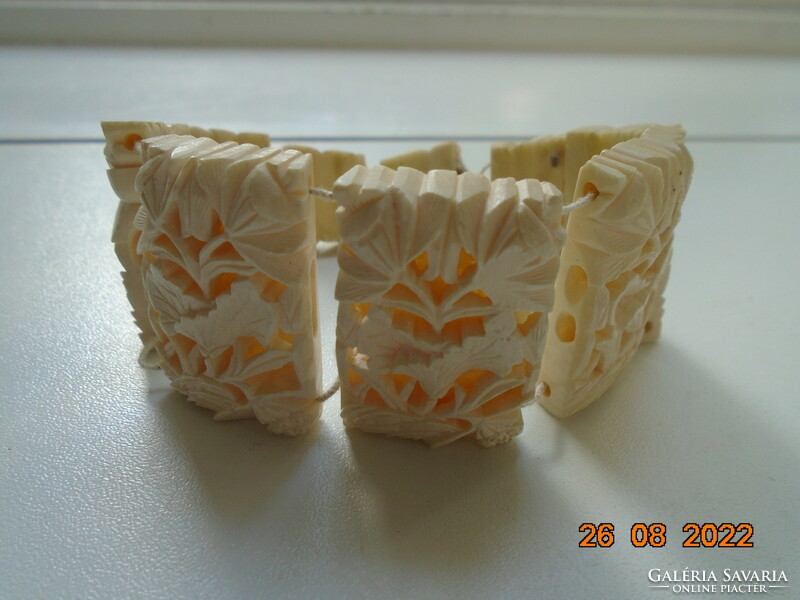 Antique, hand-carved bone, openwork oriental plant pattern wide bracelet