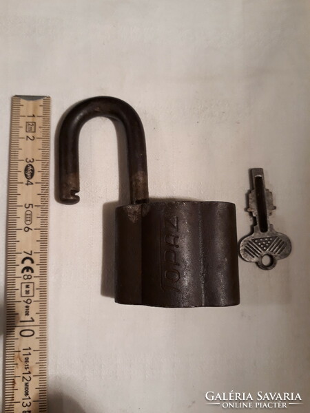 Old iron padlock with key, topaz