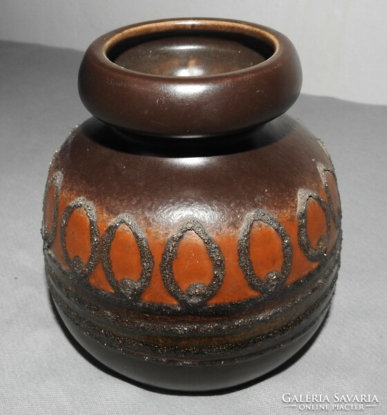 A very retro pot-bellied ceramic vase, he indicated
