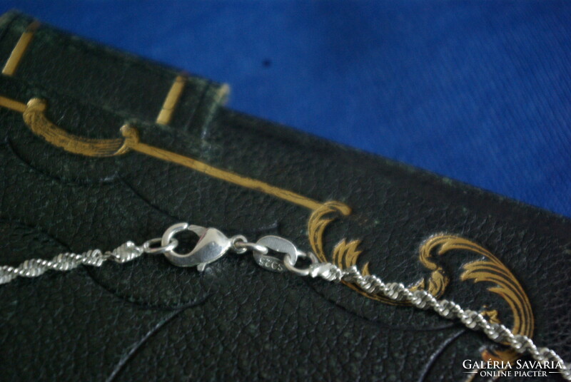Silver twisted necklace.