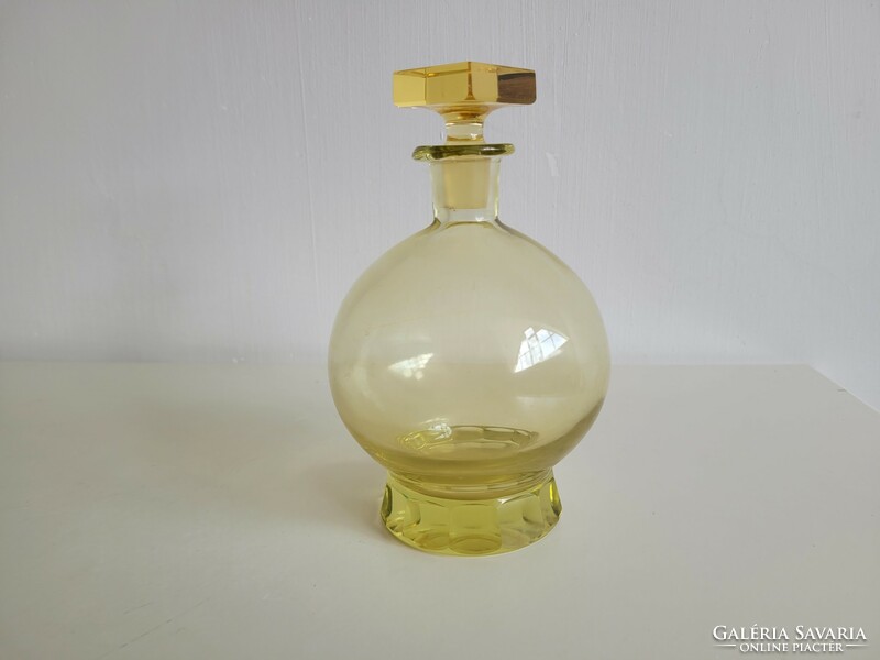 Old liqueur glass yellow short drink spherical corked bottle