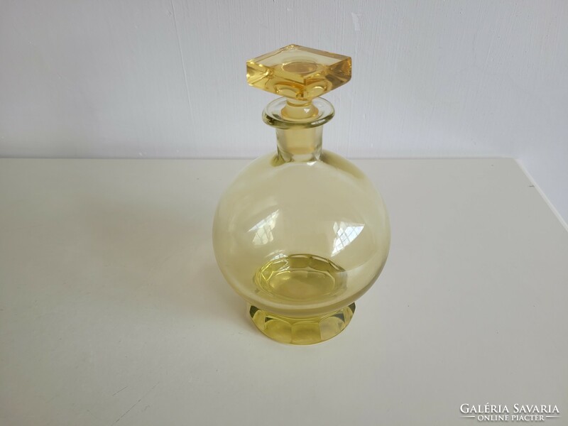 Old liqueur glass yellow short drink spherical corked bottle