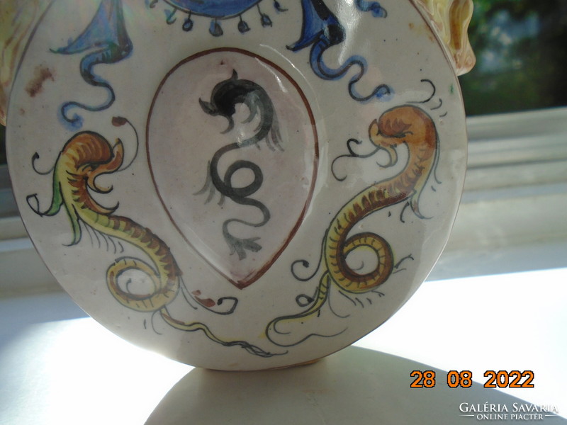 Antique renaissance majolica vase with faun heads, sea monsters and Florentine lilies