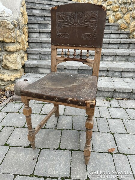 Antique pewter leather chair