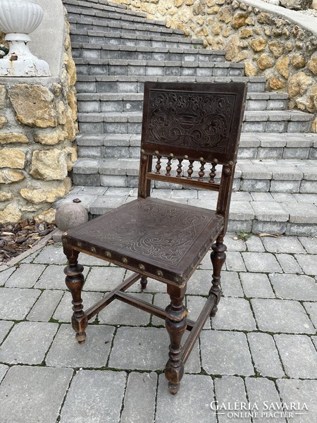 Antique historicizing pewter leather chair