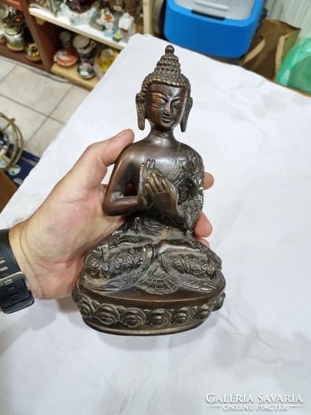 Oriental copper Buddha figure