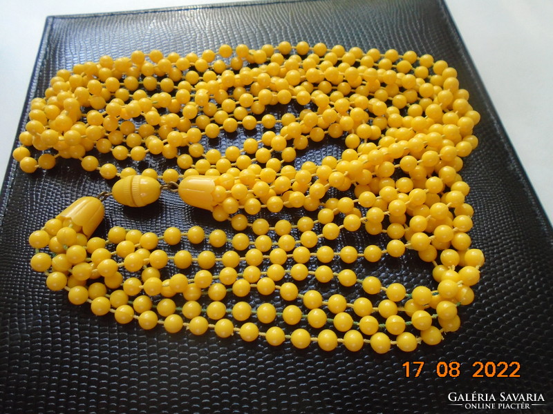 Antique golden yellow 6-row necklace with screw clasp, made of individually looped pearls