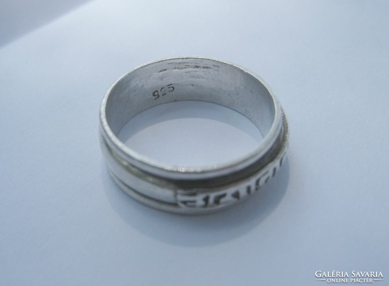 Silver ring with rotatable mantra and inscription