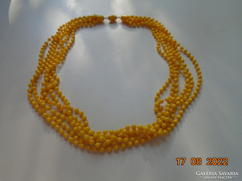 Antique golden yellow 6-row necklace with screw clasp, made of individually looped pearls