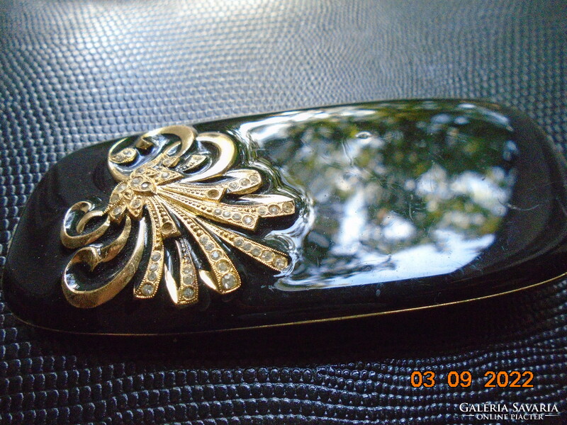 Designer art deco gilded black enamel dress jewelry, belt buckle with protruding stone spectacular flower